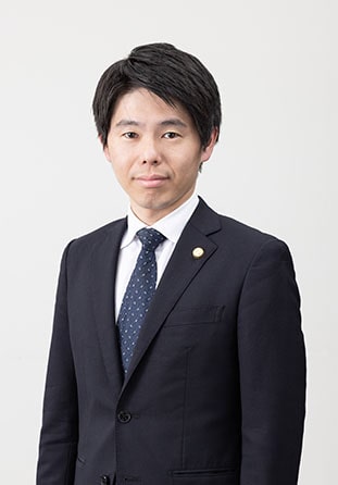 粟津 正博